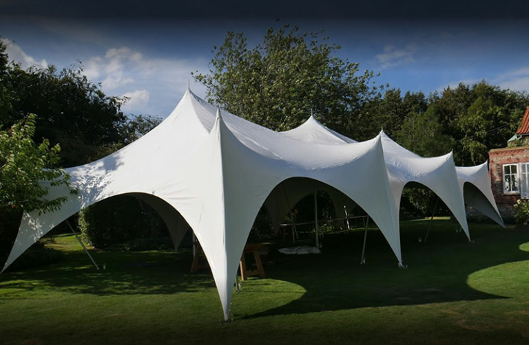 Capri / Espree marquee with flowing white peaks